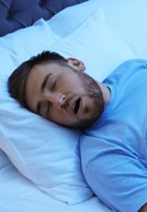 Closeup of man sleeping with his mouth open