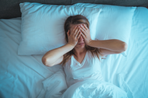 a patient struggling to sleep due to sleep apnea